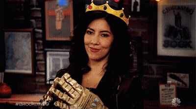 Woman Wearing Crown Holding Brooklyn99 Glove GIF