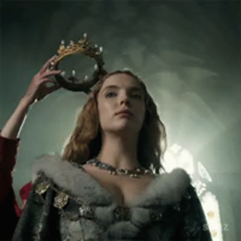 Woman Wearing Crown In Dark Room GIF