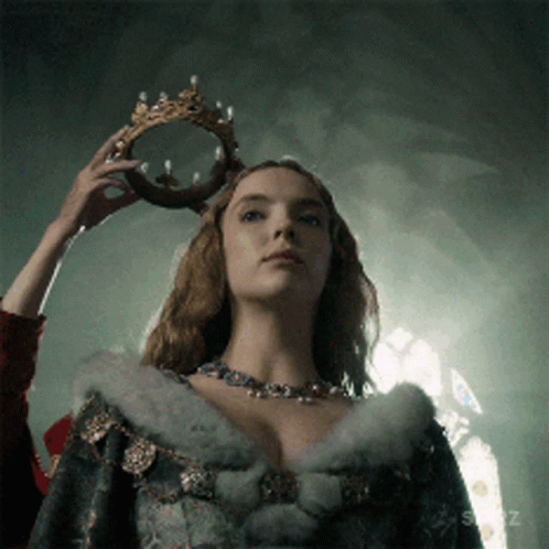 Woman Wearing Crown In Dark Room GIF