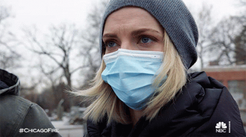 Woman Wearing Face Mask And Beanie With #Chicagofire GIF
