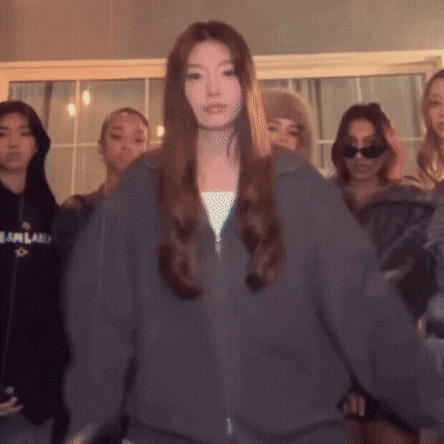 Woman Wearing Fearland Grey Sweatshirt GIF