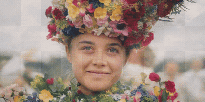 Woman Wearing Flower Wreath GIF