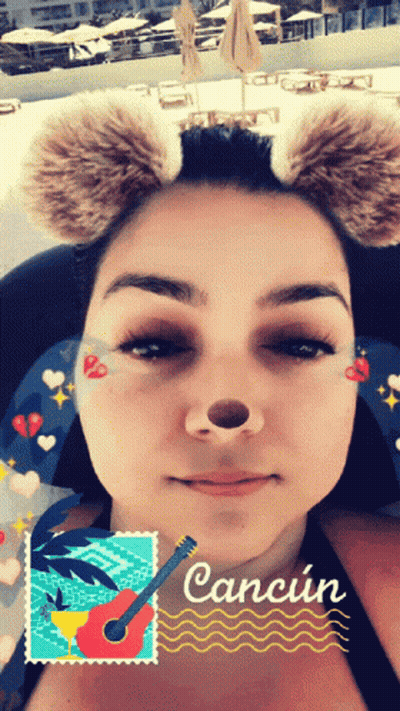 Woman Wearing Furry Ears And Cancun Stamp GIF