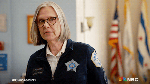 Woman Wearing Glasses And Chicago Police Jacket GIF