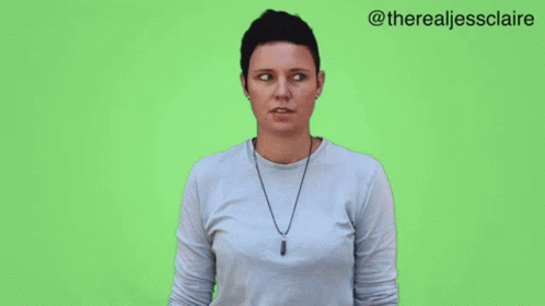 Woman Wearing Glasses And Leopard Shirt Making Funny Face GIF