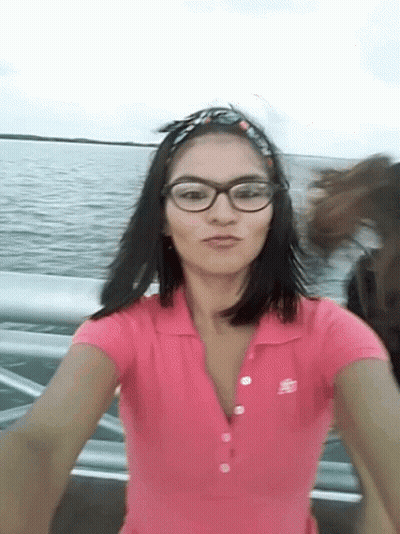 Woman Wearing Glasses And Pink Abercrombie Shirt GIF
