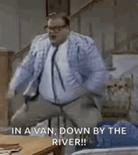 Woman Wearing Glasses And Scarf Saying Wait What GIF