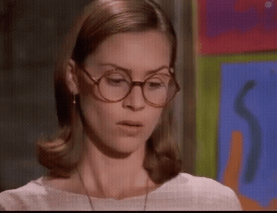 Woman Wearing Glasses And White Shirt GIF