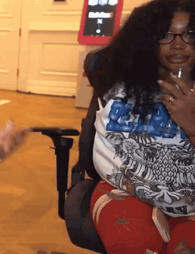 Woman Wearing Glasses Holding Water GIF