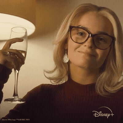 Woman Wearing Glasses Holding Wine GIF