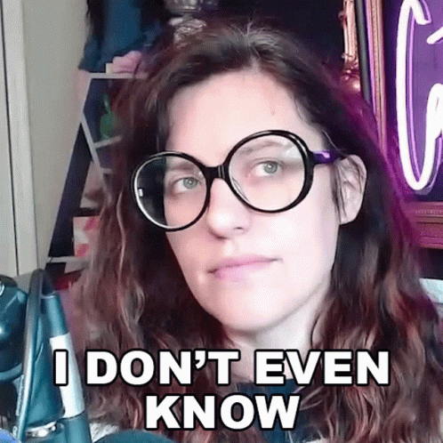 Woman Wearing Glasses Saying I Don't Know GIF