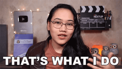 Woman Wearing Glasses Says What I Do GIF