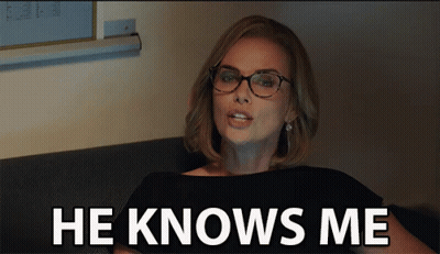 Woman Wearing Glasses Sitting On Couch GIF