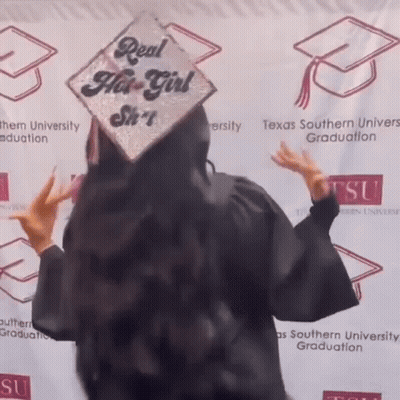 Woman Wearing Graduation Cap That Says Real Hot Girl GIF