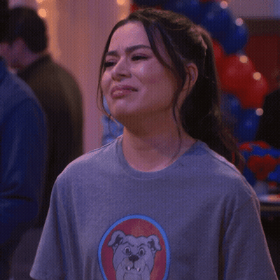 Woman Wearing Gray Shirt With Dog GIF