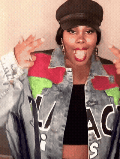 Woman Wearing Hat And Denim Jacket GIF