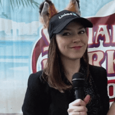 Woman Wearing Hat Saying Linked GIF