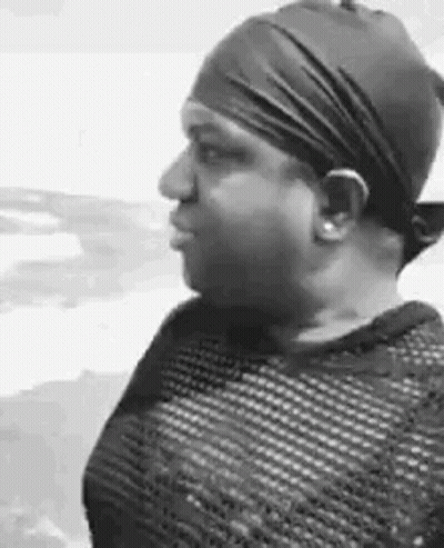 Woman Wearing Headband And Hat GIF