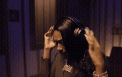 Woman Wearing Headphones And Brooklyn Shirt GIF