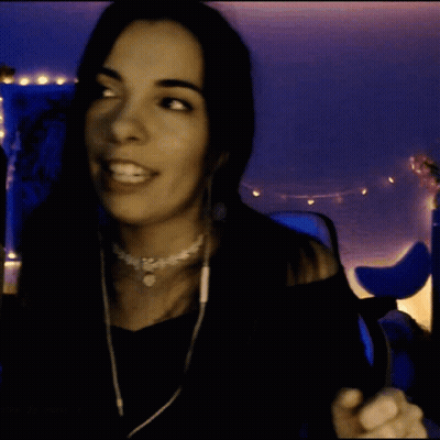 Woman Wearing Headphones And Choker Smiling GIF