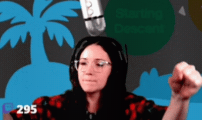 Woman Wearing Headphones And Glasses At Microphone GIF