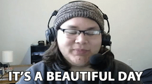 Woman Wearing Headphones And Glasses Says It's A Beautiful Day GIF