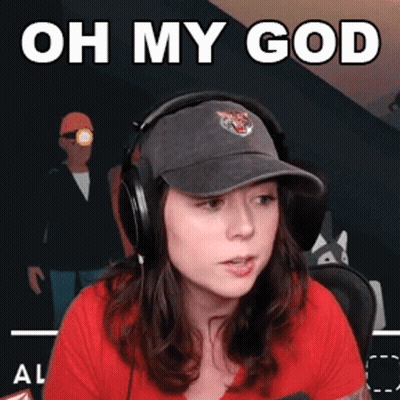 Woman Wearing Headphones And Hat Says Oh My God GIF