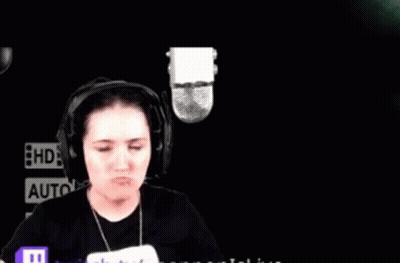 Woman Wearing Headphones And Microphone Making Face GIF