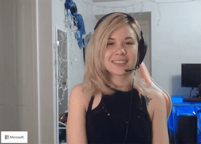 Woman Wearing Headphones And Microsoft Logo GIF