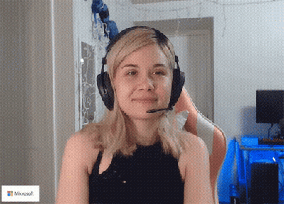 Woman Wearing Headphones And Microsoft Logo GIF
