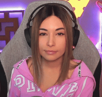 Woman Wearing Headphones and Pink Hoodie