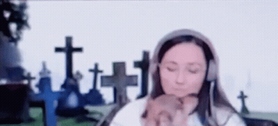 Woman Wearing Headphones Holding Puppy GIF