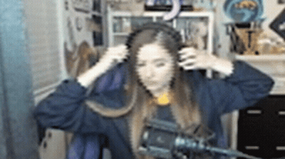 Woman Wearing Headphones In Front Of Microphone GIF
