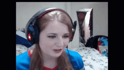 Woman Wearing Headphones Making Funny Face GIF