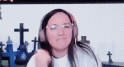 Woman Wearing Headphones Making Funny Face GIF