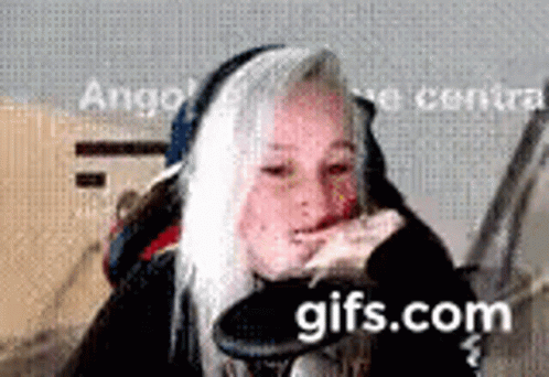 Woman Wearing Headphones Making Funny Face GIF