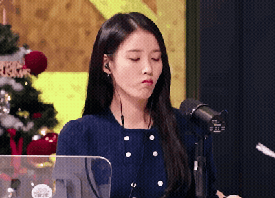 Woman Wearing Headphones Making Funny Face GIF