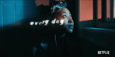Woman Wearing Headphones Netflix Ad GIF