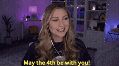 Woman Wearing Headphones Saying May The 4Th Be With You GIF