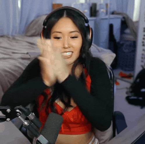 Woman Wearing Headphones Smiling GIF