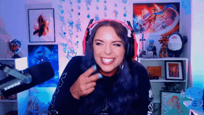Woman Wearing Headphones Smiling In Front Of Shure Microphone GIF