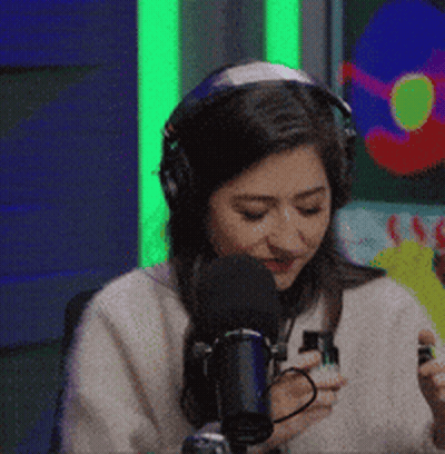 Woman Wearing Headphones Talking Into Microphone GIF
