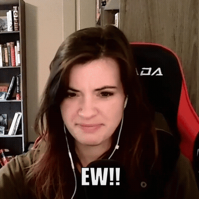 Woman Wearing Headphones With Ew On Face GIF