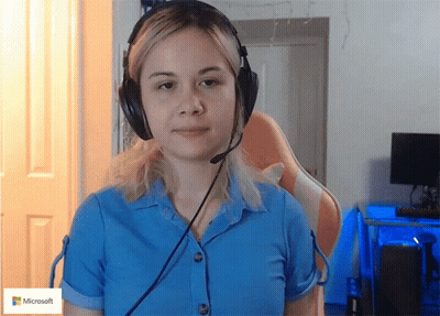 Woman Wearing Headphones With Microsoft Logo GIF