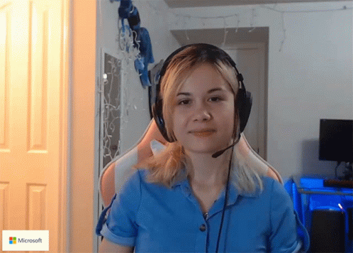 Woman Wearing Headphones With Microsoft Logo GIF