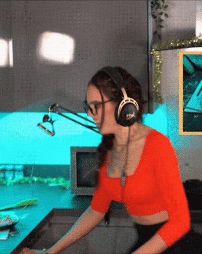Woman Wearing Headphones With X GIF
