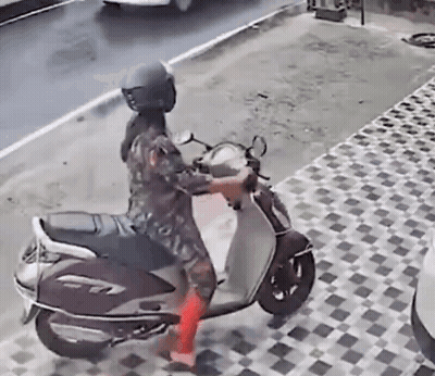Woman Wearing Helmet Riding Scooter GIF