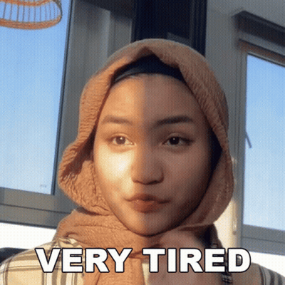 Woman Wearing Hijab Looking Very Tired GIF