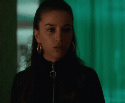Woman Wearing Hoop Earrings GIF