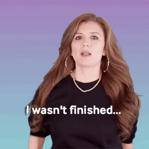 Woman Wearing Hoop Earrings And Necklace Says I Wasn't Finished GIF